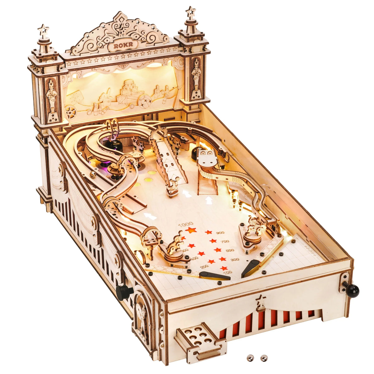 Wooden pinball machine with decorative top frame, curved tracks, and ball launch