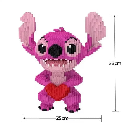 Pink angel building-block figure with big ears, black eyes, and red heart on chest