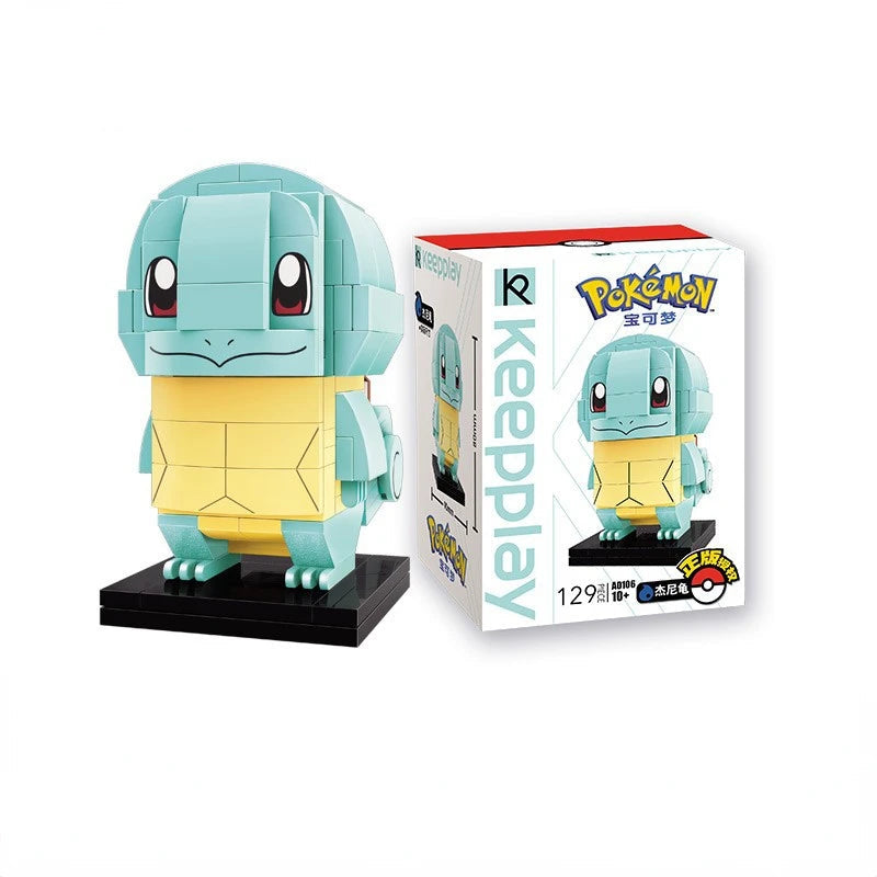 Squirtle brick building figure on a black base beside its product box