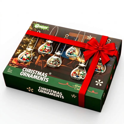 Christmas building ornament set in a gift box with a red ribbon