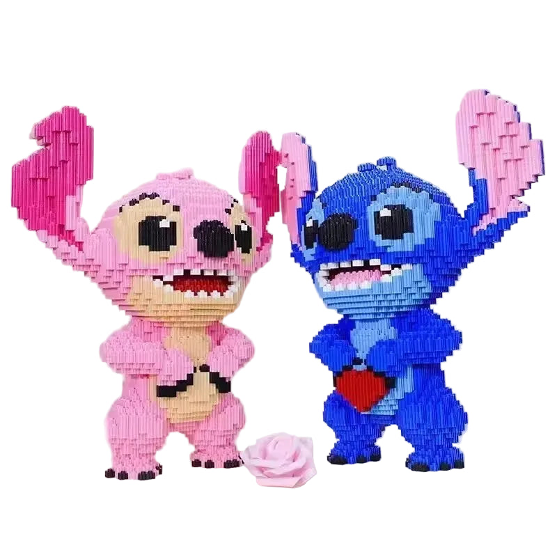 Two angel building-block figures: pink and blue, each with a heart chest