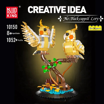 Golden brick bird sculpture on a base with branching frame and green berry decor