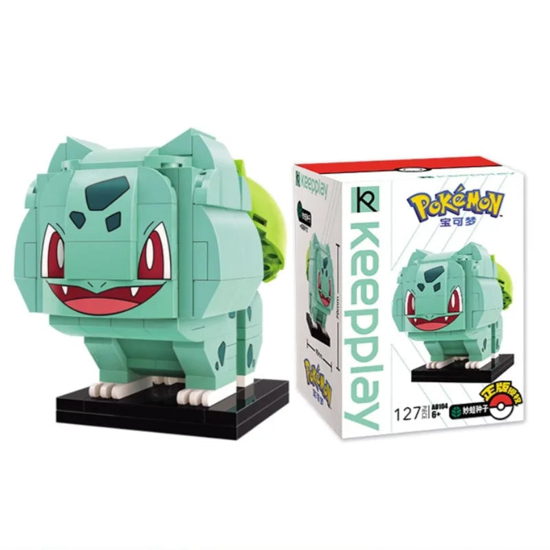 Bulbasaur brick building figure on a black base beside its product box