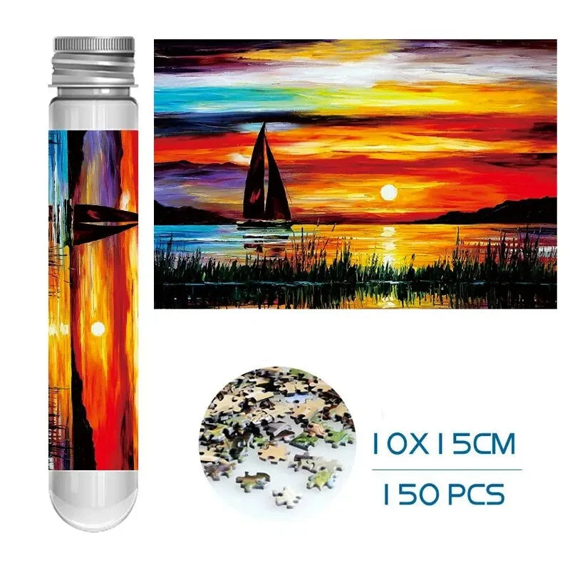 Mini puzzle tube set with colorful sunset over sailboats and 150-piece jigsaw preview