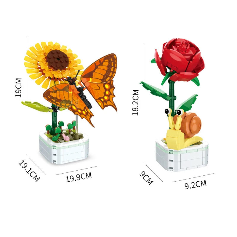 Orange butterfly and red ladybug building sets on white block bases with stems