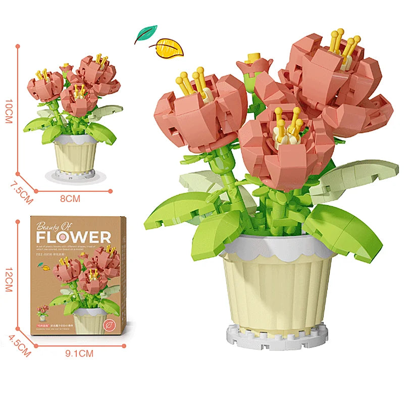 Peach and green flower pot building blocks with pink blossoms in a cream pot