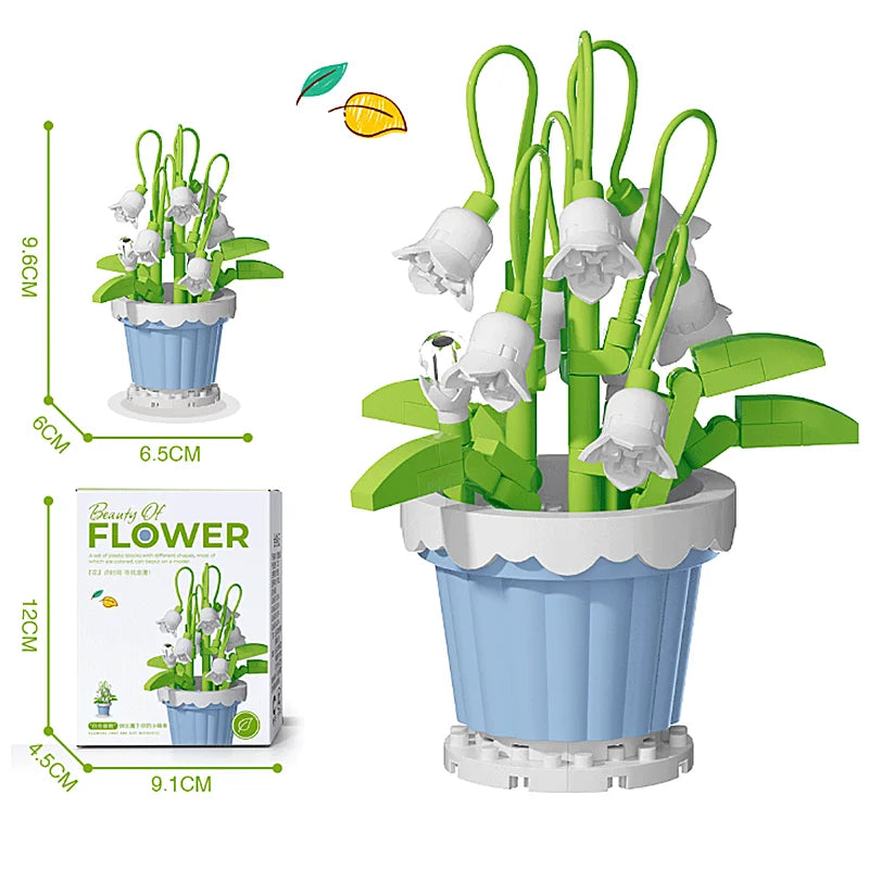 Green stem flower building blocks in a blue pot with white blossoms, with boxed set
