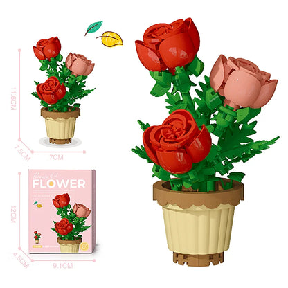 Red and green flower pot building blocks with large rose pieces in a tan pot