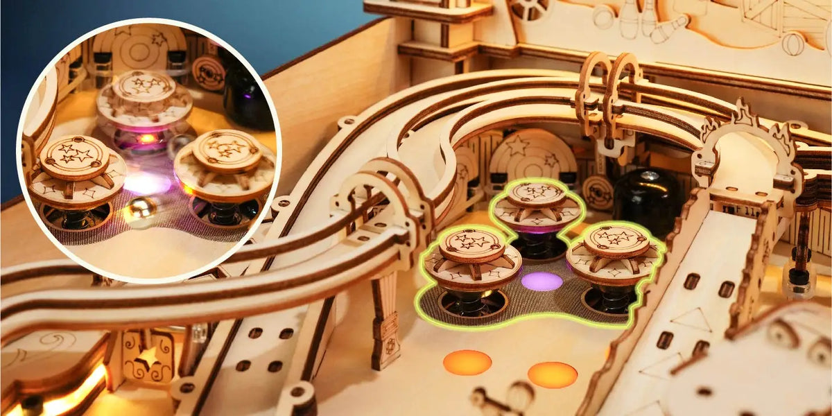 Wooden pinball machine interior close-up with glowing purple scoring wheels