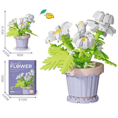 Flower pot building blocks set with assembled green flower and yellow centers in planter
