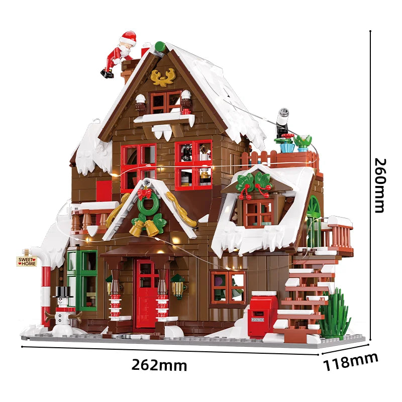 Christmas chalet building set with Santa figure and overall size 262mm x 118mm
