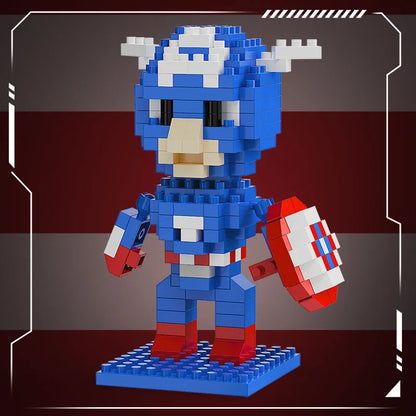 Mini brick hero figure in blue and white holding a red-and-white shield on blue base
