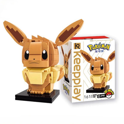 Eevee brick building figure with long ears on a black display base, beside its product box