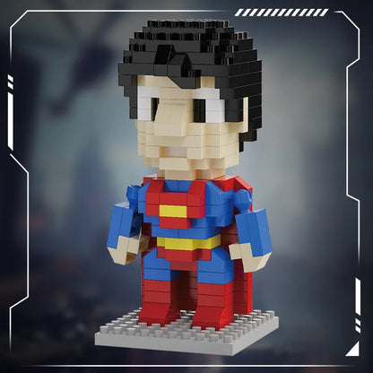 Blue and red mini brick hero figure with dark hair and yellow belt on gray studded base
