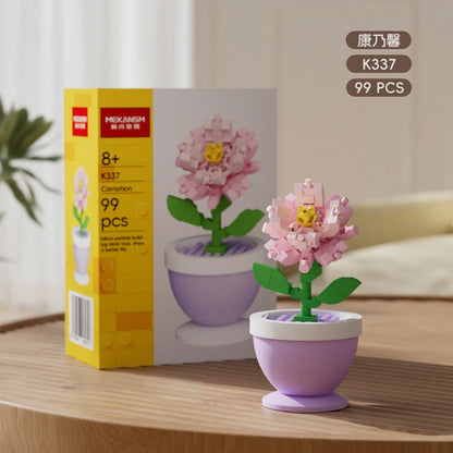 Pink flower building blocks in a lilac pot with green leaves, with boxed set