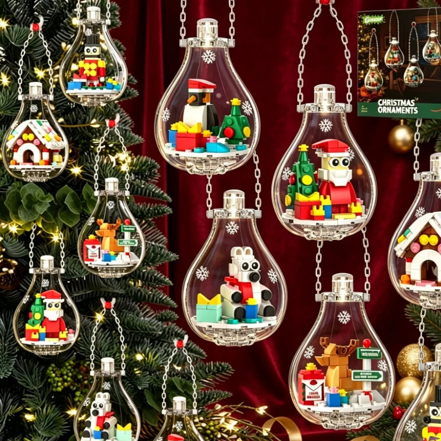 Christmas building ornament set displayed in clear hanging bulbs with brick scenes