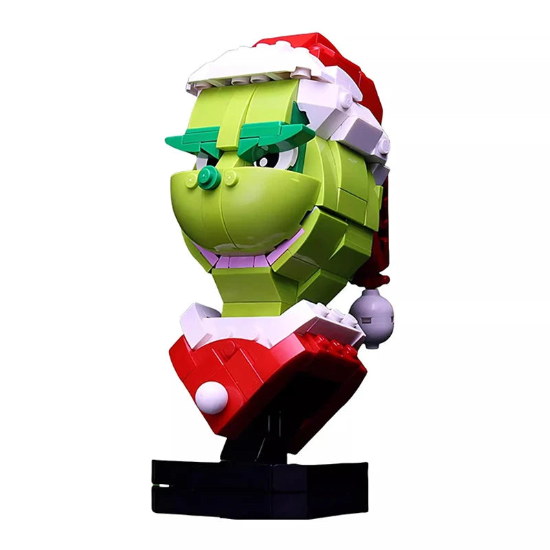 Brick-built green character head with red heart-shaped chest, purple and black details