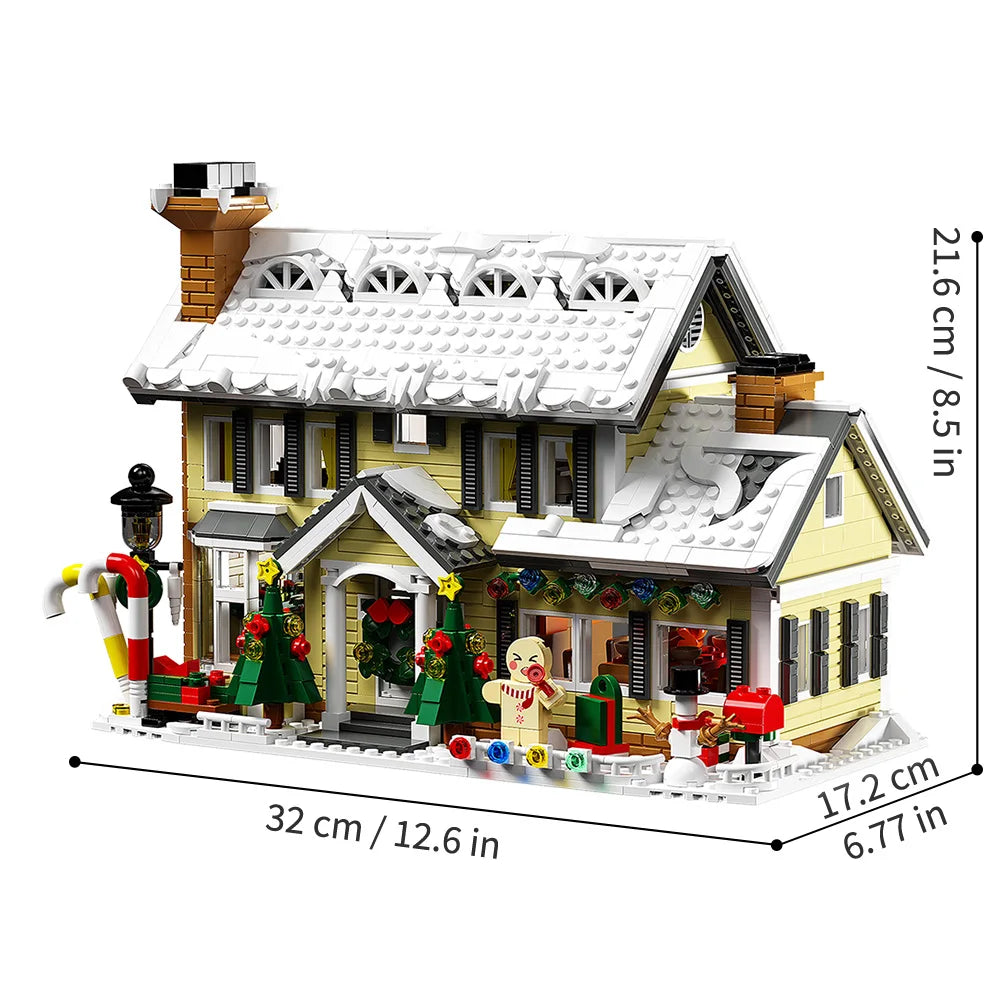 Winter cottage building block house with snow roof, porch, and front holiday figures