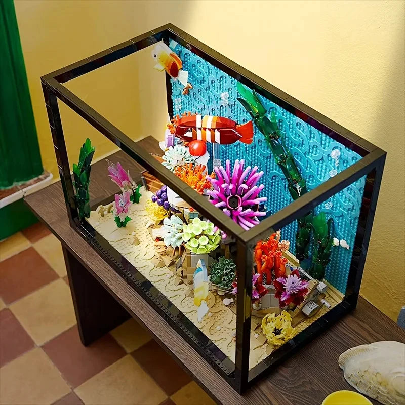 Black-framed aquarium building set corner view with coral and fish scene
