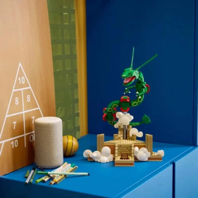 Dragon figure on tan base with white cloud pieces, shown against blue backdrop display