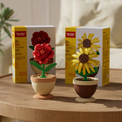 Flower building blocks set with red and yellow flower pots plus two boxed packages