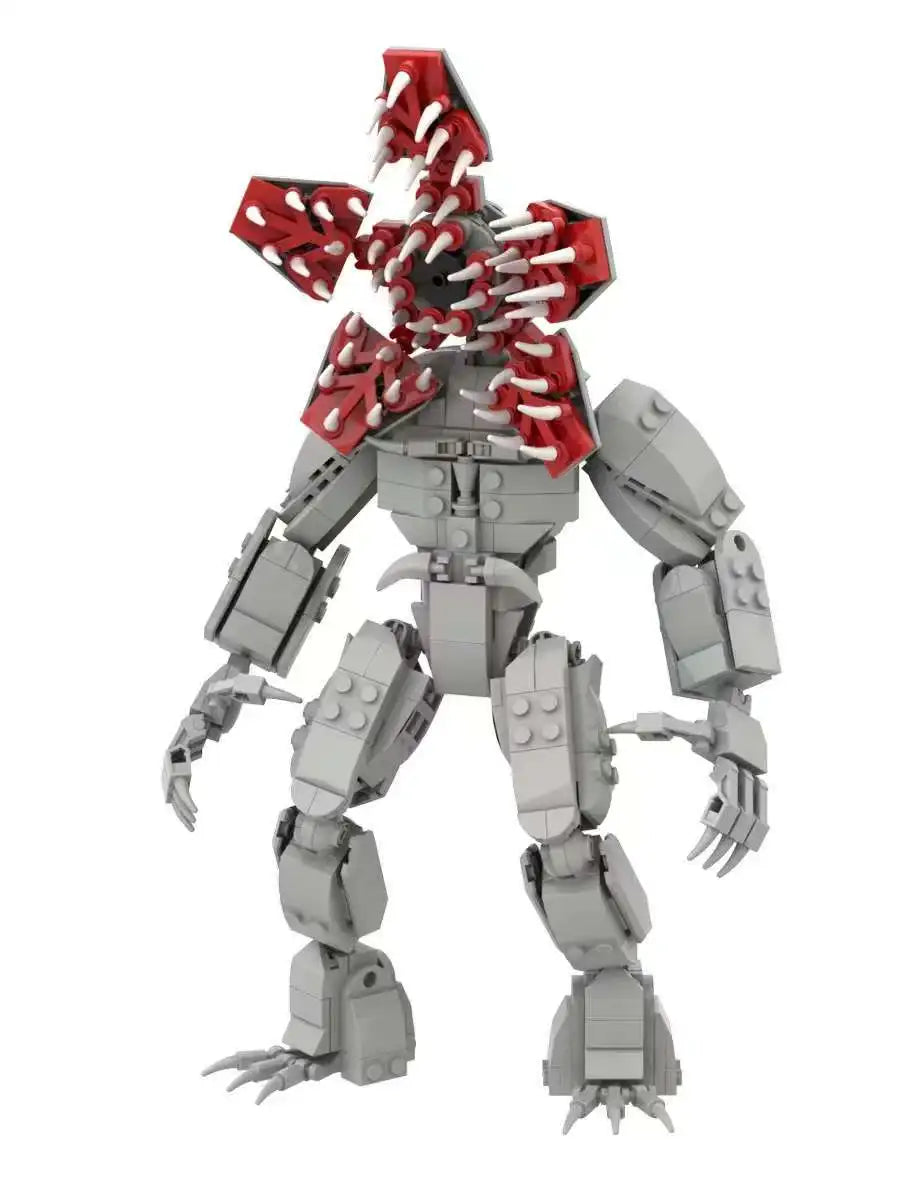 Brick-built monster robot with gray legs and red clawed arms, side view