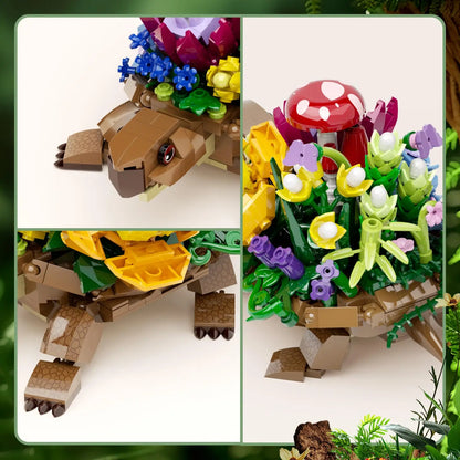 Floral turtle building set close-up: green leaves, yellow rose, red cap, brown legs