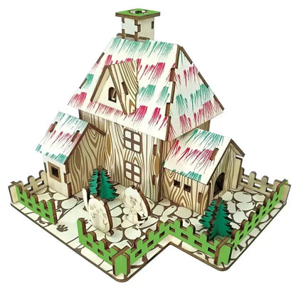 Wooden mini house model with striped roof, rocky yard, pine trees, and green fence