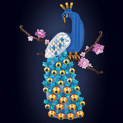 Blue and white brick bird sculpture covered in blue circular pieces with pink blossoms