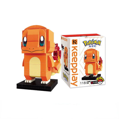 Charmander brick building figure on a black base beside its product box