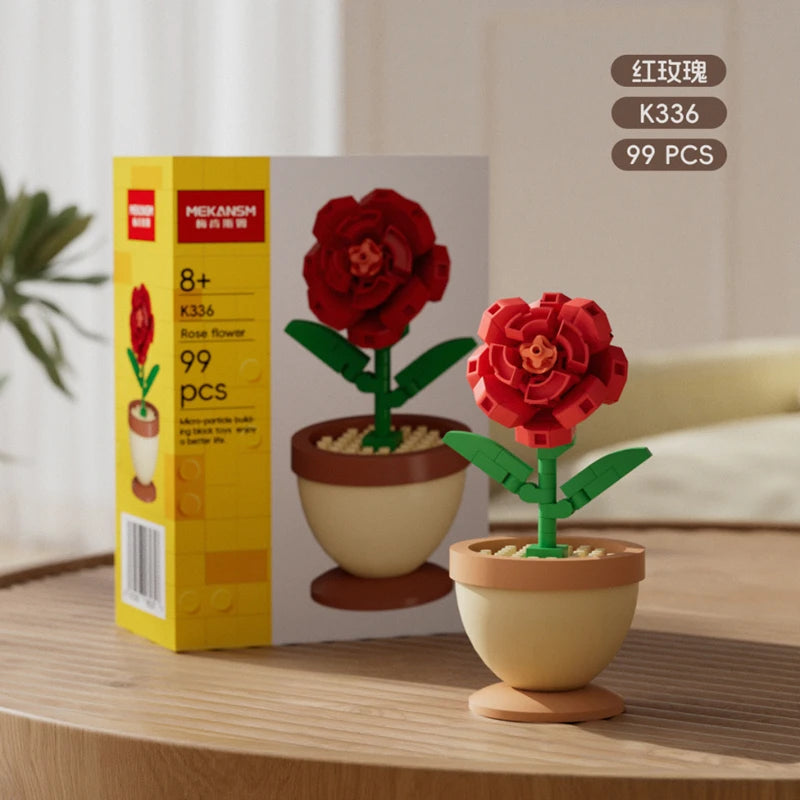 Red rose-like flower building blocks in a beige pot with green stem, with yellow box