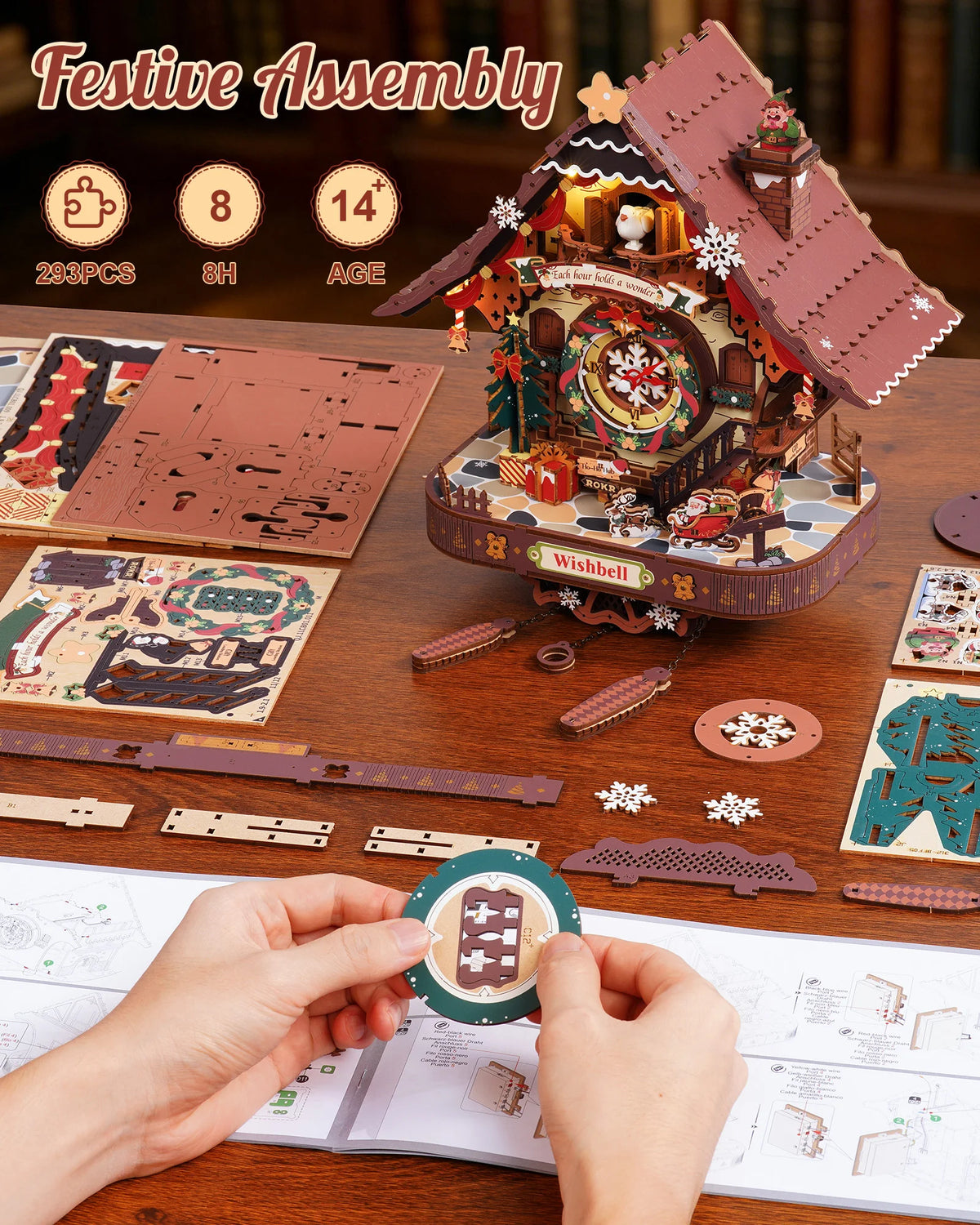 Christmas wooden cuckoo clock puzzle beside its unassembled wooden pieces and instructions
